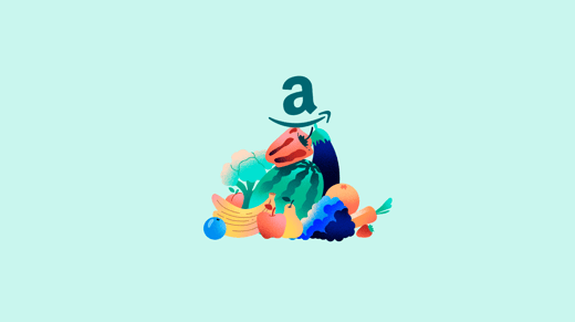 Amazon logo on top of a pile of fruits and vegetables